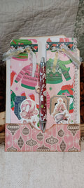 Handmade pink Christmas stationery set with two holiday notepads, Christmas pen, paper ephemera and tag-shaped holder