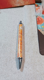 Coordinating autumn pumpkin pen included with handmade journal set
