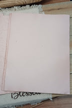 Naturally avocado-dyed paper showing subtle blush color and organic tonal variation