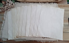 Coffee-dyed paper showing natural mottling and handmade tonal variation