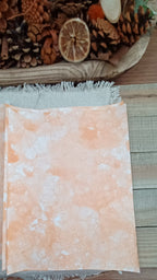 Handmade Dark Orange bubble art paper with soft mottled coloring and naturally varied bubble impressions