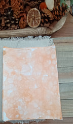 Dark Orange hand-patterned paper featuring overlapping bubble marks, pale open areas, and warm mottled color