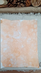 Handmade Dark Orange decorative paper showing large pale bubble impressions and softly blended organic patterns