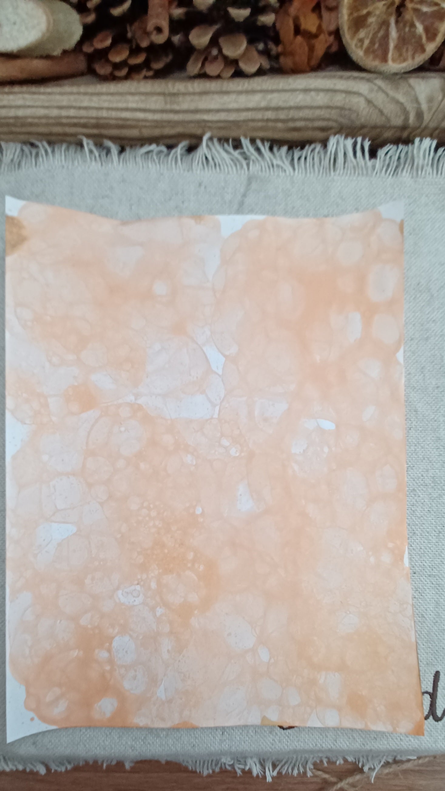 Handmade Dark Orange decorative paper showing large pale bubble impressions and softly blended organic patterns