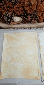 Mustard bubble-blown paper with delicate cellular patterns, pale open areas, and naturally overlapping bubble impressions
