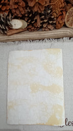 Pale Mustard bubble-blown paper showing open white areas and subtle organic bubble patterns - Back side of paper