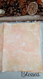 Handmade Orange and Mustard paper with soft blended color and subtle organic patterns created by blown bubbles