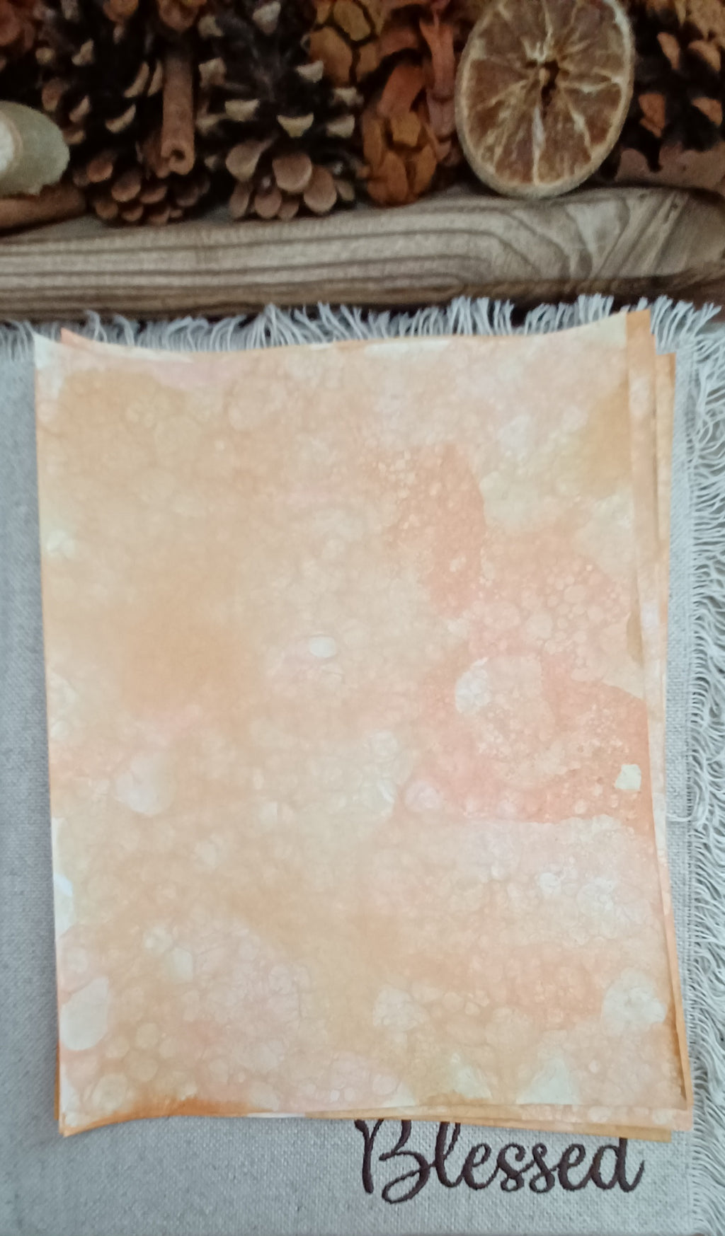 Orange and Mustard hand-patterned paper with varied bubble density and softly blended warm color