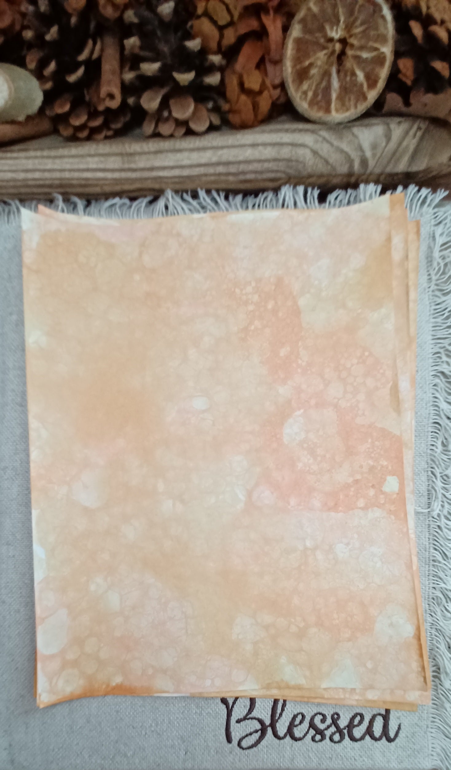 Orange and Mustard hand-patterned paper with varied bubble density and softly blended warm color
