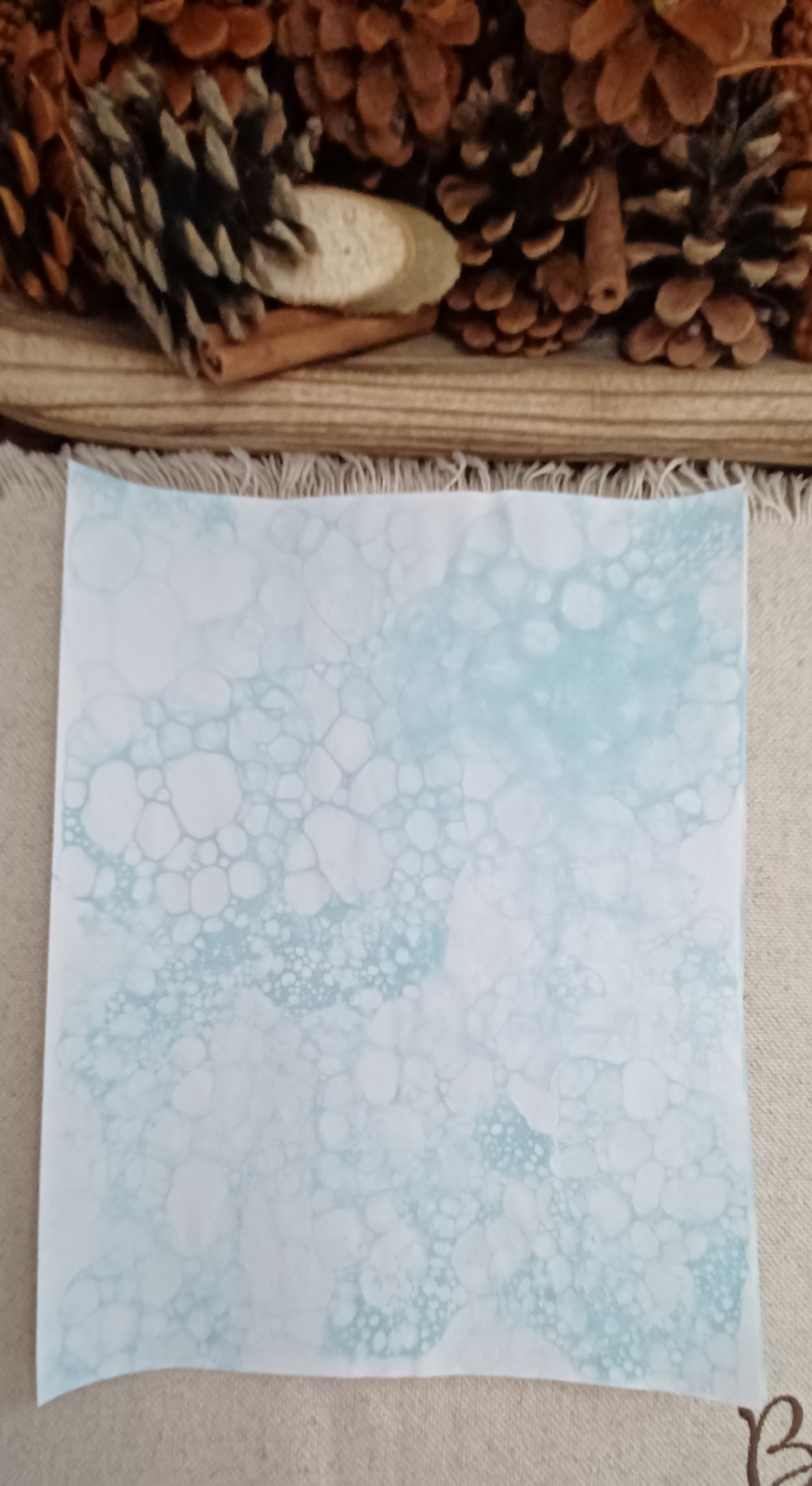 Light Blue bubble-blown decorative paper with large open circles surrounded by delicate clusters of tiny bubbles