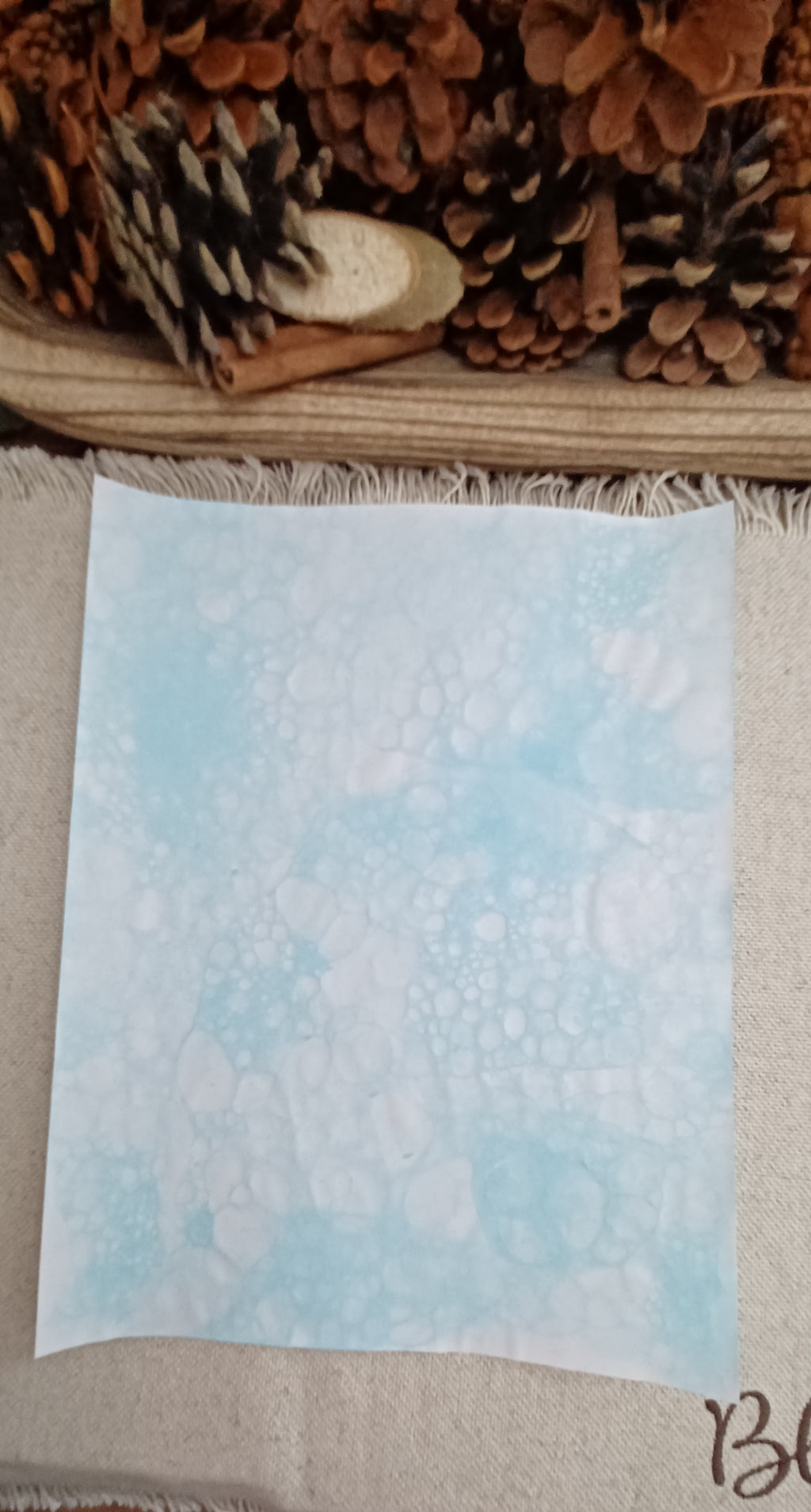 Light Blue hand-patterned paper with soft blue washes and delicate overlapping bubble impressions