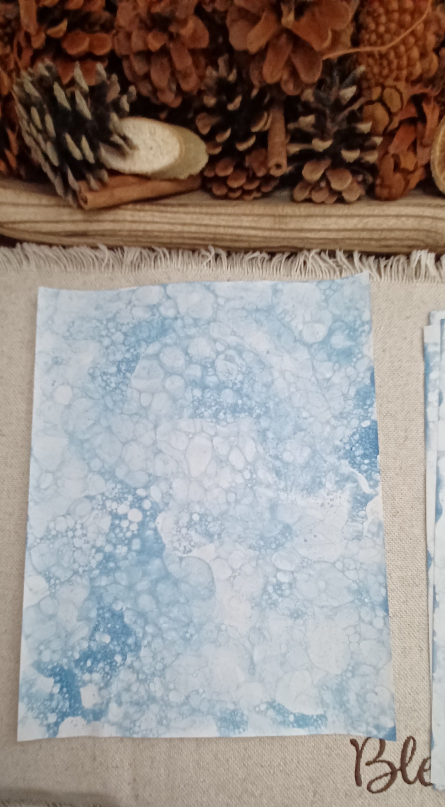 Denim Blue bubble-blown paper showing open areas and delicate blue bubble markings