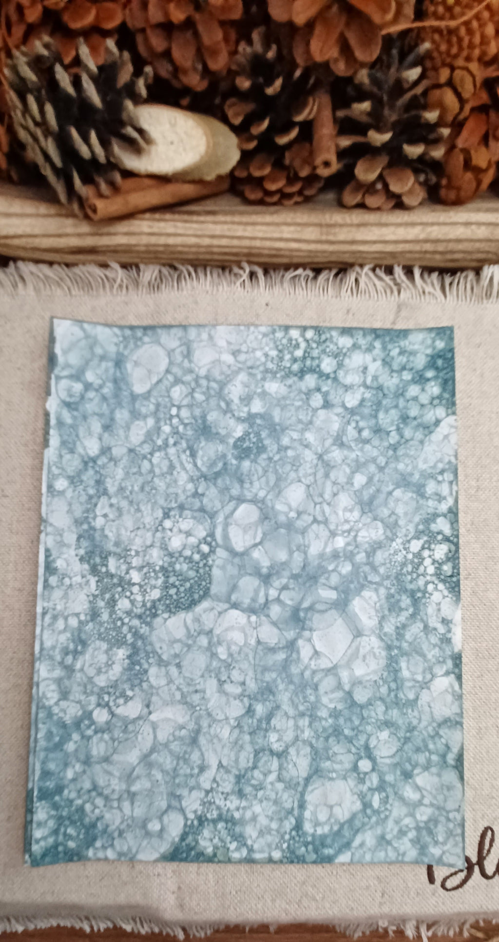 Handmade Green bubble art paper featuring dense cellular bubble patterns and naturally varied color placement