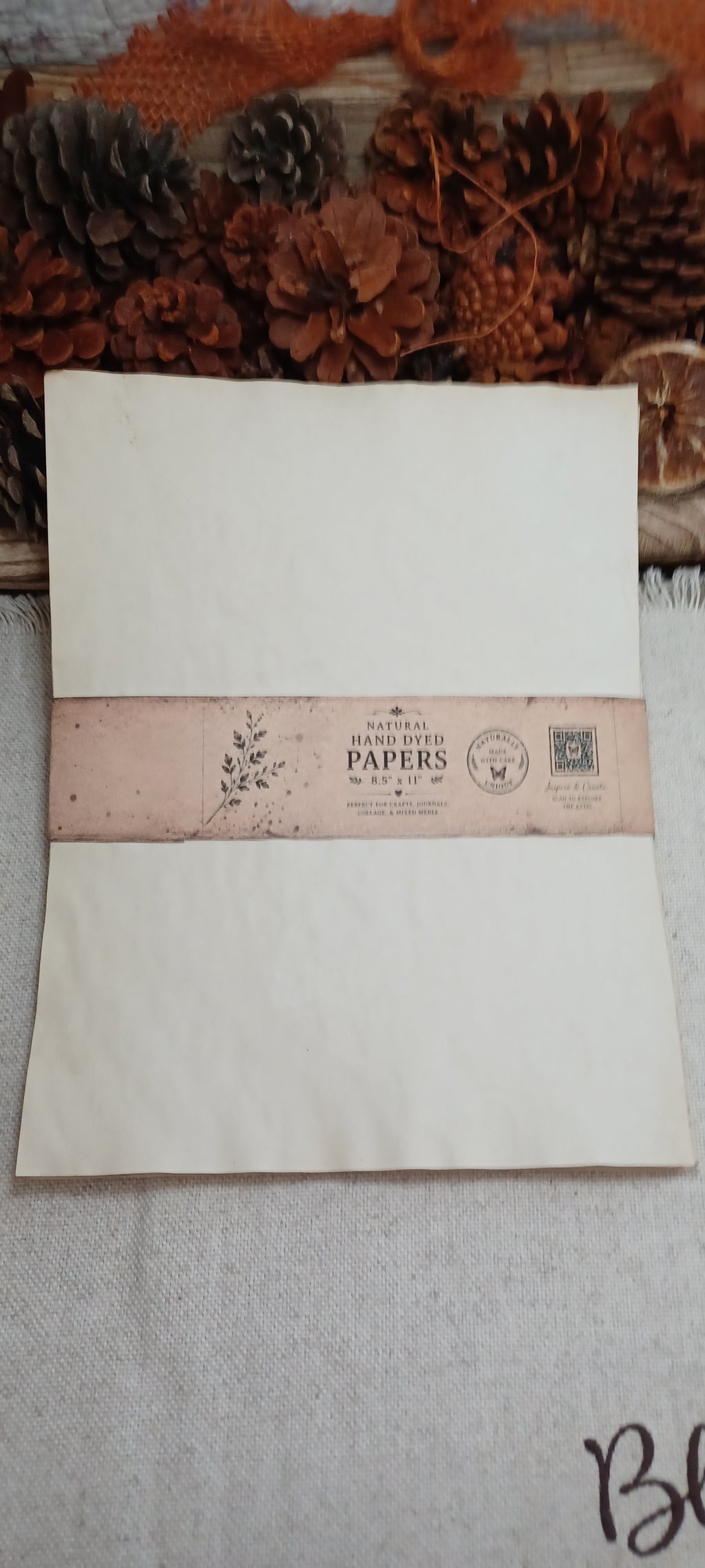 Hand-dyed tea paper sheets showing natural variations in tone, texture and pattern
