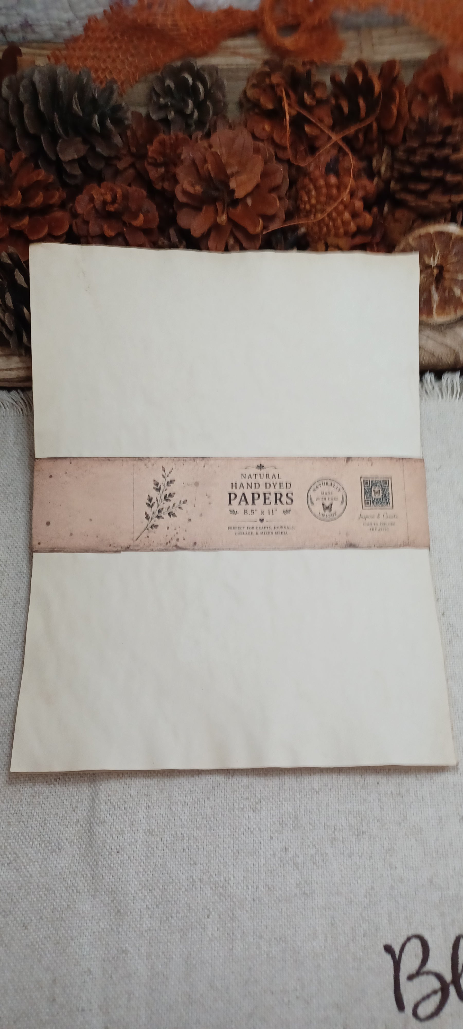 Hand-dyed tea paper sheets showing natural variations in tone, texture and pattern