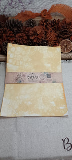 Mustard bubble-blown paper set wrapped with a Butterfly in the Attic Wind Kissed Papers belly band