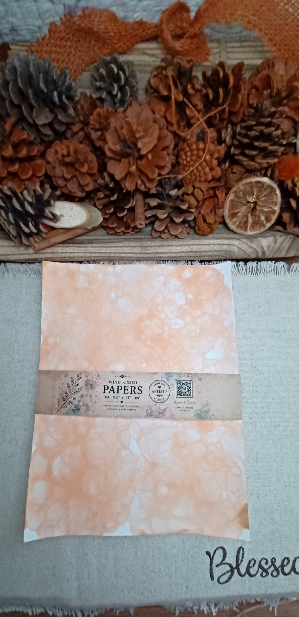 Coordinating set of five Dark Orange bubble-blown decorative papers wrapped with a Butterfly in the Attic paper band