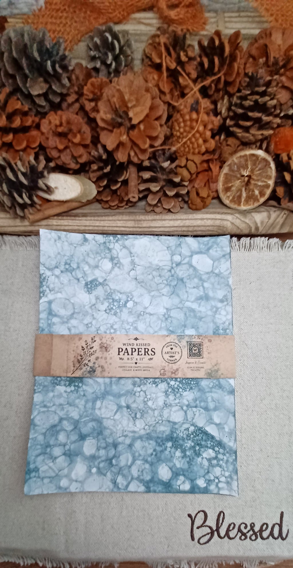 Coordinating set of five Green bubble-blown decorative papers wrapped with a Butterfly in the Attic paper band