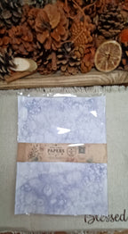 Coordinating set of five Purple bubble-blown decorative papers wrapped with a decorative paper product band and plastic bag