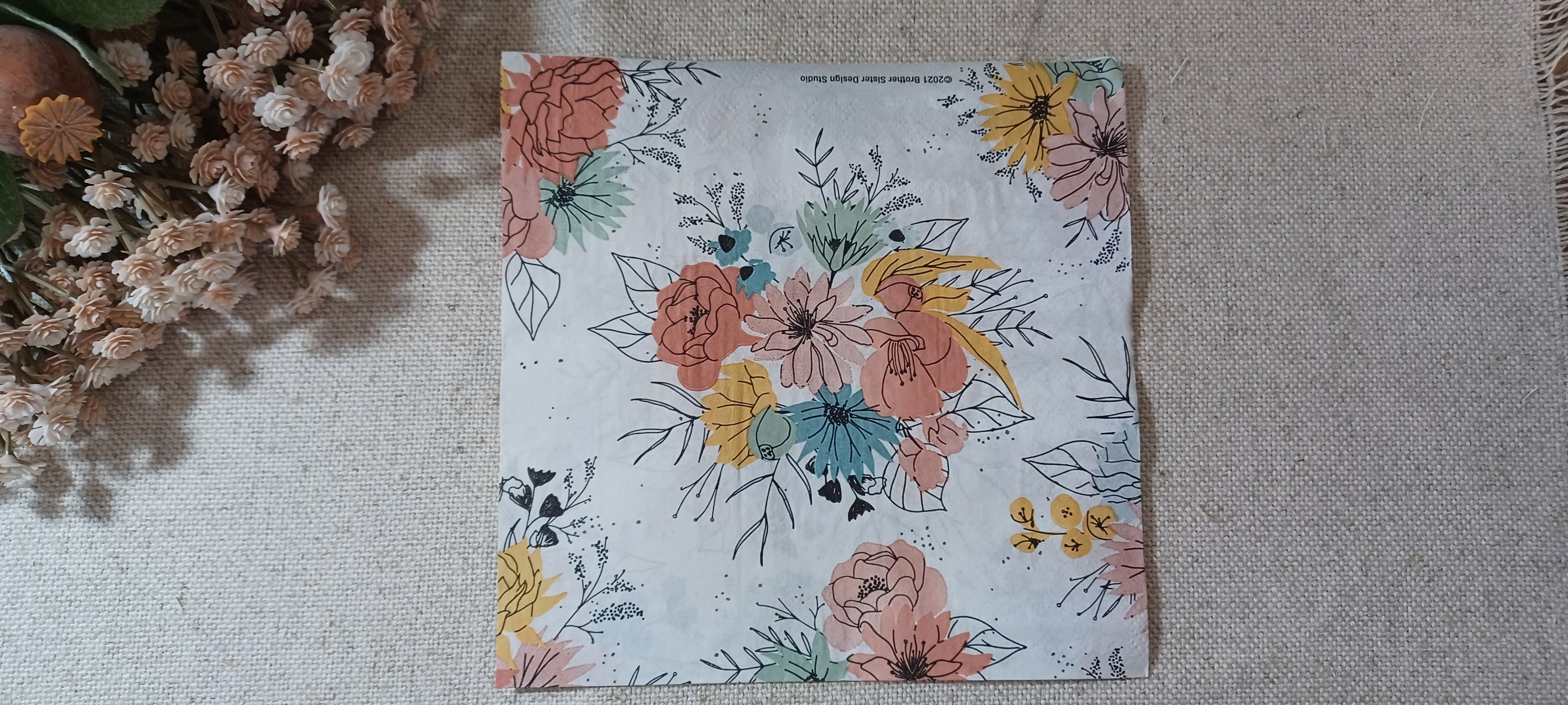 Modern floral luncheon napkin with coral, mustard yellow and teal botanical bouquets for decoupage and collage.