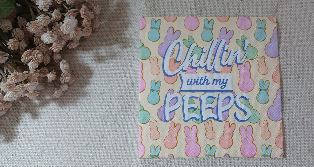 Chillin’ with my PEEPS Easter paper napkin with pastel pink, purple and aqua bunny shapes on a cream background.