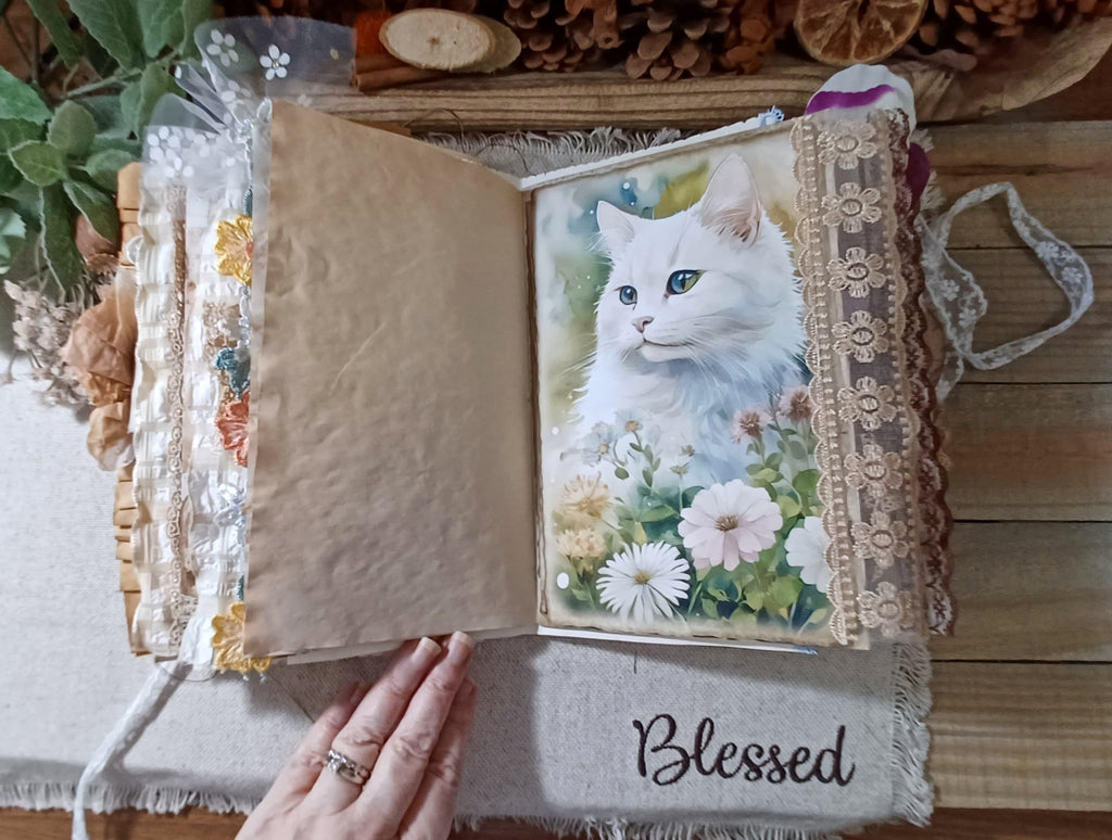Layered cat-themed journal page with vintage kitten artwork, decorative paper and handmade details.