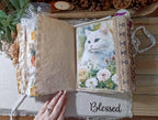 Layered cat-themed journal page with vintage kitten artwork, decorative paper and handmade details.