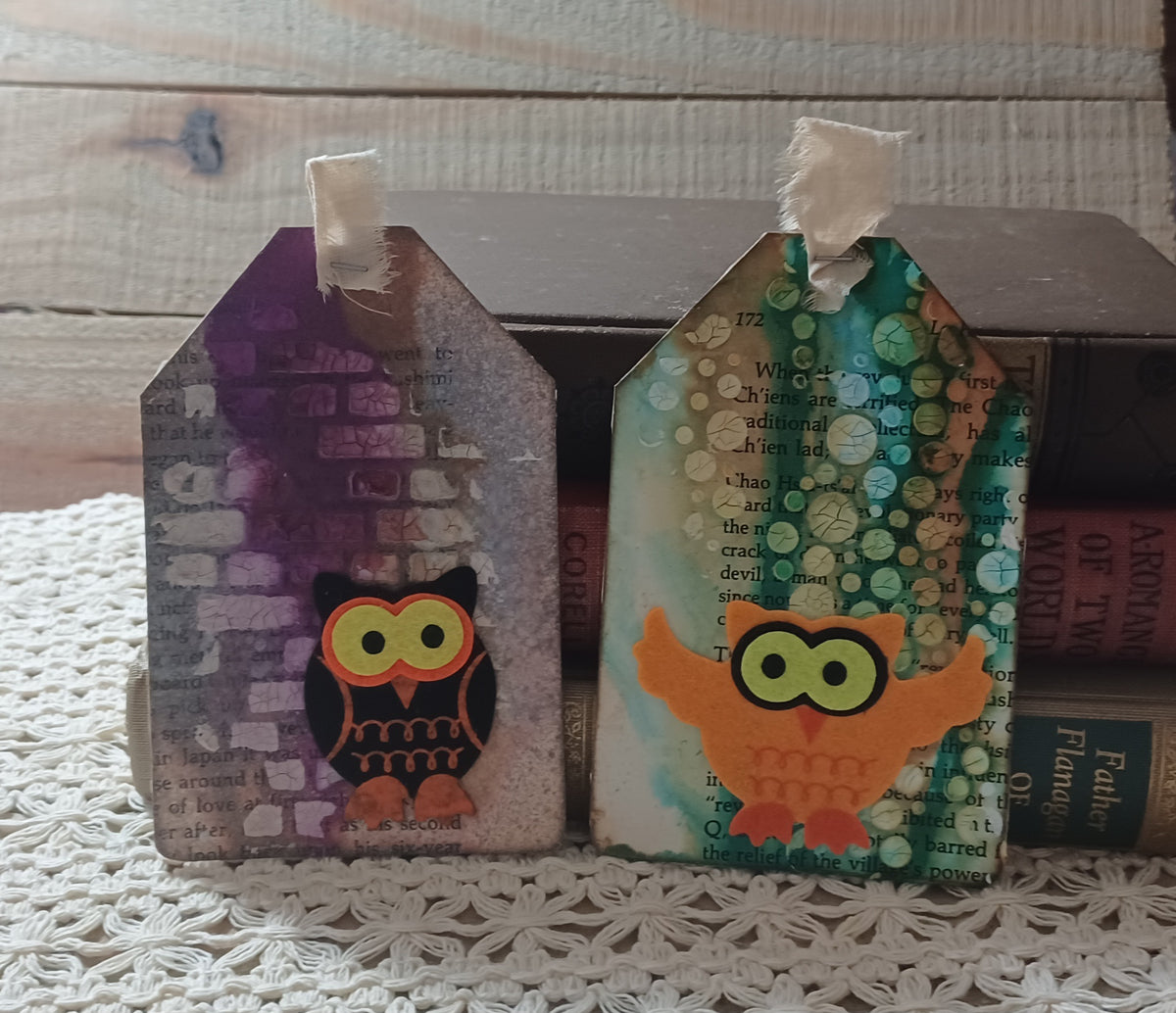 Set of two handmade owl journal tags with purple cracked brickwork and turquoise green patina over vintage book pages