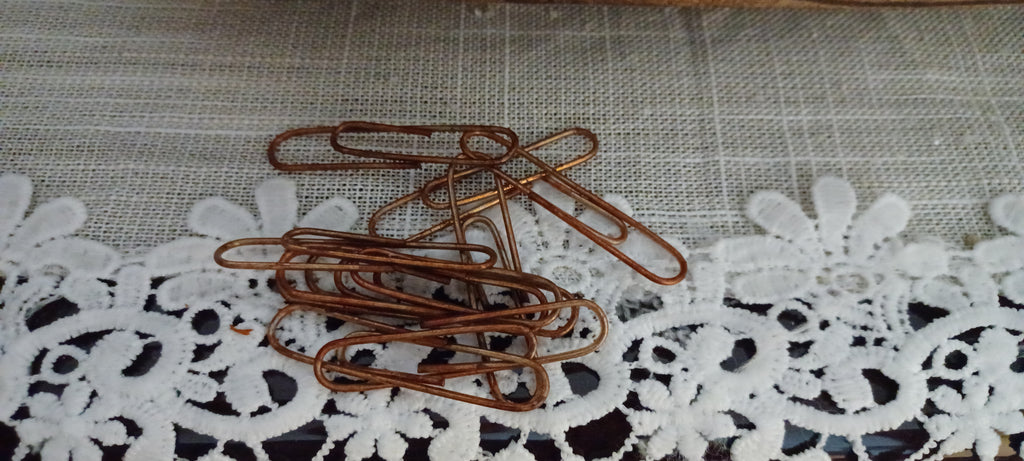 Oversized 2-inch coppery-brown paper clips packaged in a clear sleeve with a vintage-inspired Butterfly In The Attic backing card.