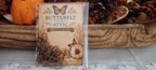 Set of 20 small faux rust paper clips in a clear sleeve with a Butterfly In The Attic backing card.