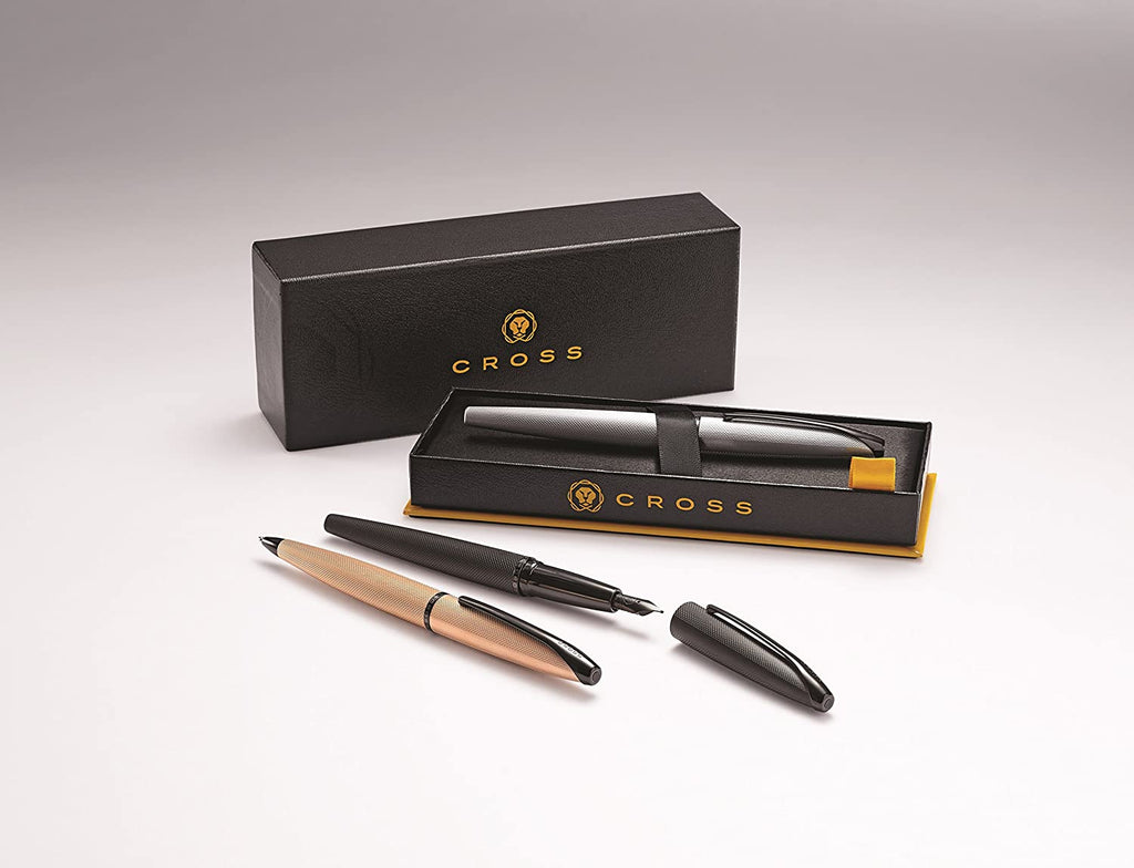 Cross ATX brushed rose gold ballpoint pen shown with representative Cross gift packaging