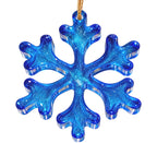 Reverse side of handmade translucent blue resin snowflake ornament showing glossy blue resin and clear edges on white background.