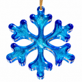 Front view of handmade blue resin snowflake Christmas ornament with shimmering turquoise and cobalt blue details and gold hanging cord on white background.