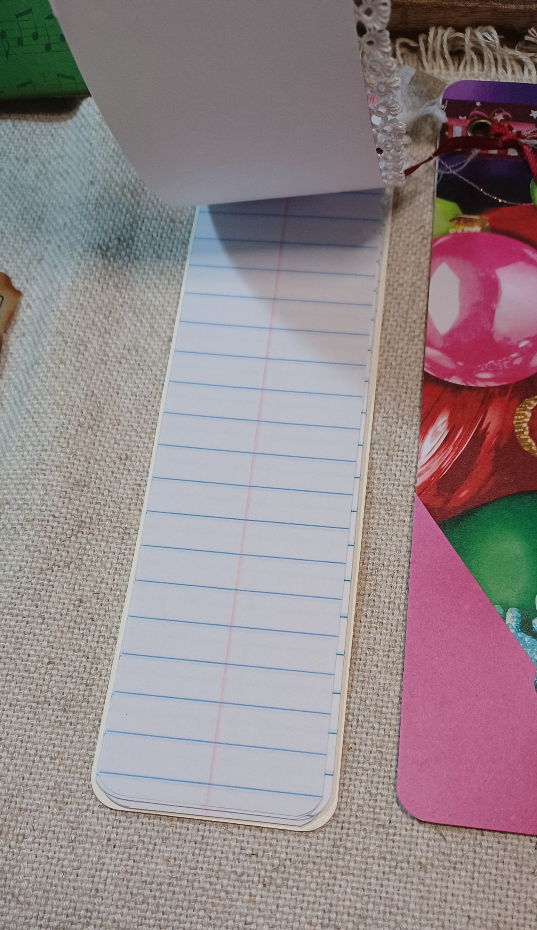 Writing pages inside handmade Merry & Bright Christmas mini journal
Loose ephemera — Vintage inspired Santa, Christmas wreath, house and ticket ephemera included with mini journal set