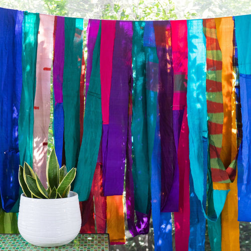 Colorful 2.5 inch wide recycled sari silk ribbons in assorted colors and patterns