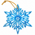 Handmade translucent icy-blue resin snowflake Christmas ornament with intricate openwork details and attached gold hanging string.