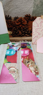 Handmade Christmas mini journals with colorful vintage ornaments, pink pockets and Santa ephemera