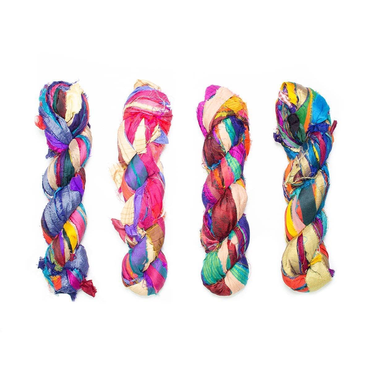 Four At the Bahamas recycled sari silk ribbon skeins showing natural variations in color and pattern