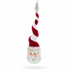 A hanging Christmas ornament shaped like a stylized Santa figure with a red-and-white striped hat, white beard, and silver lower face, shown on a clean white background.