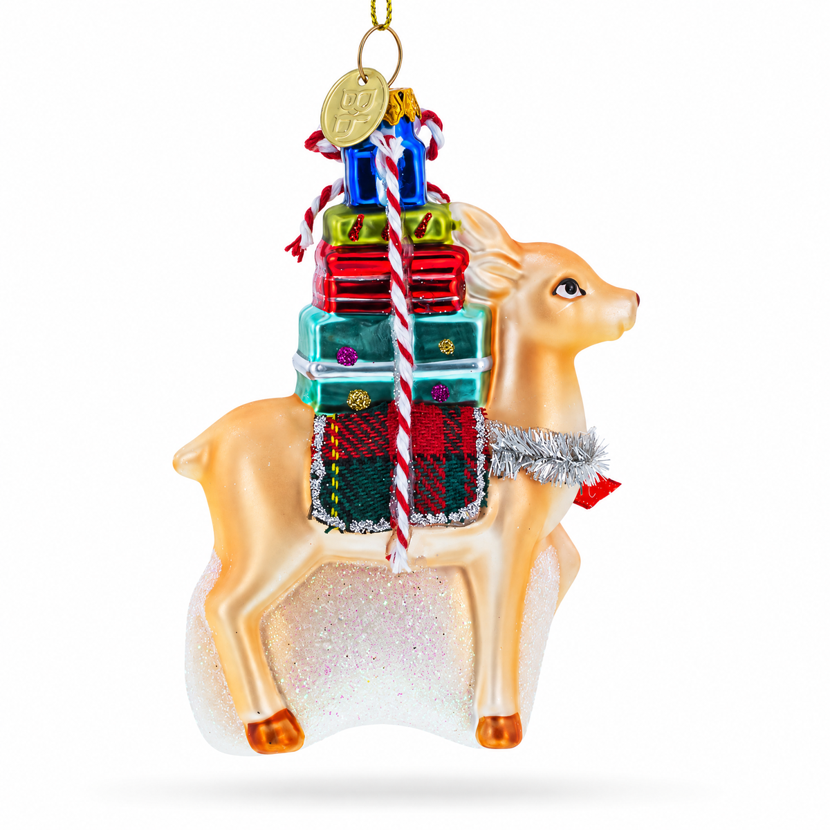 Side view of Christmas deer glass ornament carrying a tall stack of colorful presents