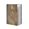 Hardcover journal featuring original photography of desert milkweed among slender stems in soft earthy desert tones.