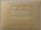 Reverse side of antique Three Twins cigar box label showing the back of the vintage paper