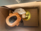 Wind-up key and original box shown with the vintage tin drummer toy