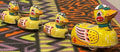 Vintage lithographed tin wind-up duck family toy with mother duck and ducklings