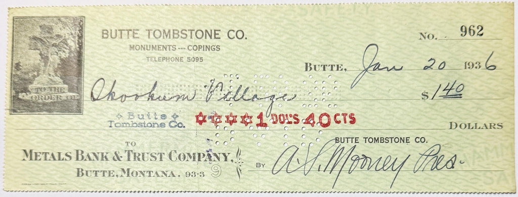 Close-up of an antique Montana business check showing its printed and handwritten details