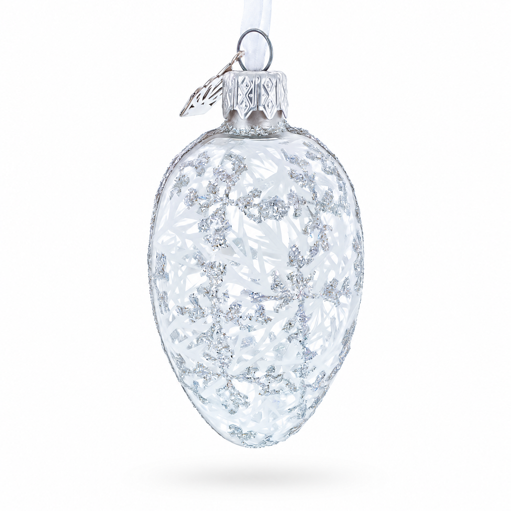 Clear glass egg Christmas ornament with icy crystalline textured appearance