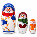 Set of three hand-painted wooden snowman Christmas nesting dolls made in Ukraine