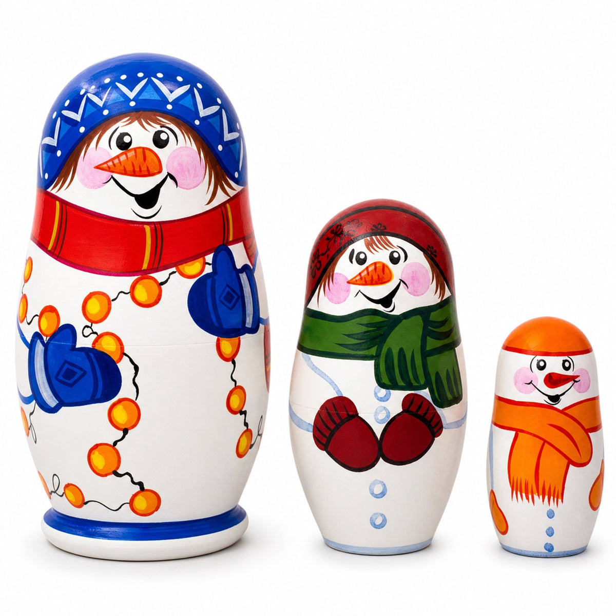 Set of three hand-painted wooden snowman Christmas nesting dolls made in Ukraine