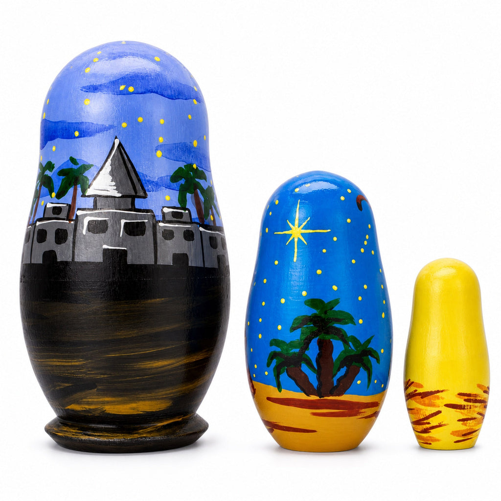 Three Ukrainian wooden Nativity nesting dolls shown opened and nested