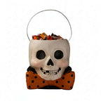 Mr. Albert Skully Halloween bucket by Bethany Lowe Designs, featuring a grinning skull, orange polka-dot bow tie, and wire handle.